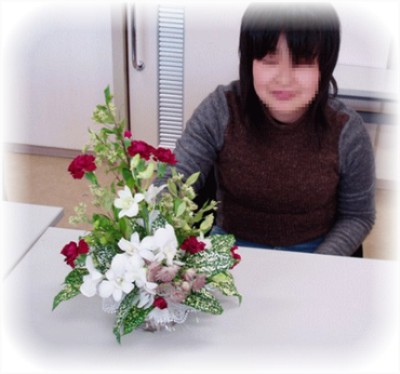 12月のあきとお花の写真